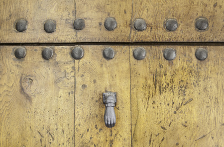 Old wooden door, detail of a door knockerの写真素材