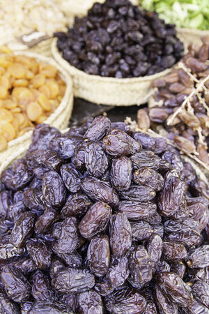 Sweet dates in a market, detail of a traditional food market, antique storeの写真素材