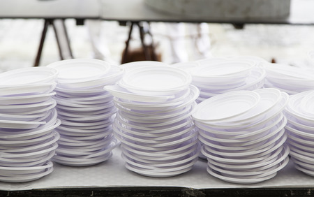Plastic trays for a party, a detail of dinner plates, disposable tablewareの写真素材