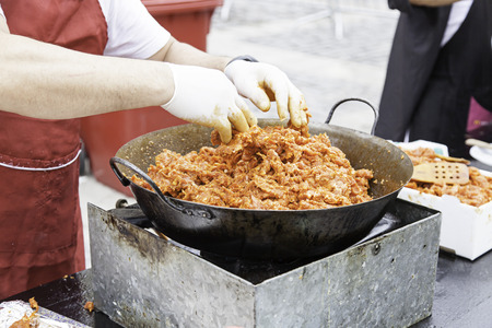 Cooking ground beef, detail of a chef preparing red meatの写真素材