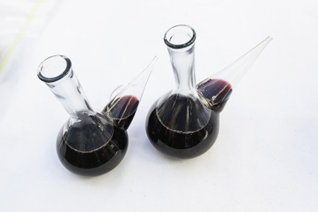 Glass container with wine, detail of typical Spanish vesselの写真素材