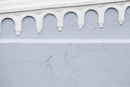 Blue wall with decoration, detail of a decoration on the outsideの写真素材