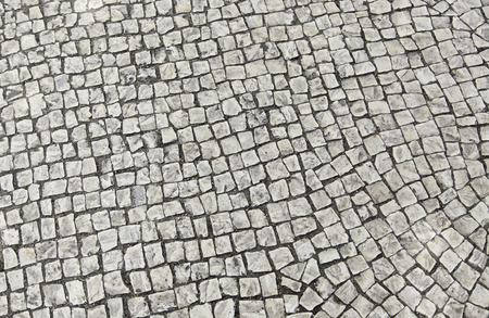 Mosaic floor, detail of a typical floor of the streets of Lisbonの写真素材