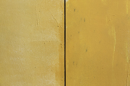 Orange textured background, detail of a wallの写真素材