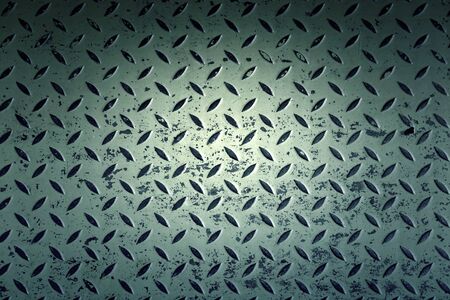 Yellow metal background, detail of a rough background, textureの写真素材