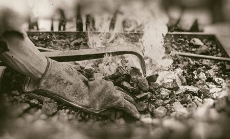 Embers in a forge, detail of an old iron forge, molding ironの写真素材