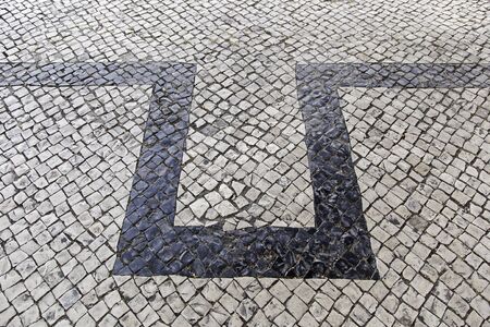Mosaic floor, detail of a typical floor of the streets of Lisbonの写真素材