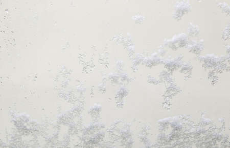 Snow on a glass, detail of snow in the winter, cold and ice