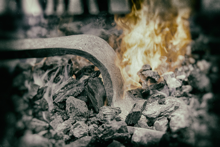 Embers in a forge, detail of an old iron forge, molding ironの写真素材