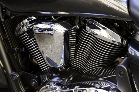 Modern new engine of big displacement motorcycle, detail of speed and powerの写真素材