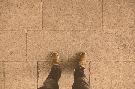 Feet floor, detail of walking boots
の写真素材