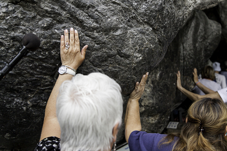 LOURDES, FRANCE - July 12, 2017: The Sanctuary of Our Lady of Lourdes, the destination for pilgrimage in France famous for the reputed healing power of its water on July 12, 2017 in Lourdes.のeditorial素材