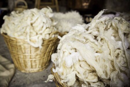 Detail of freshly cut virgin wool, detail of yarn and linen productionの写真素材