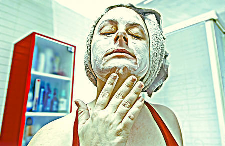 Young woman putting on facial creams, detail of beauty and body care