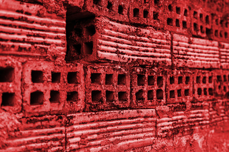 Old broken wall made of mud bricks, textured background detail, neglect and ruinの写真素材