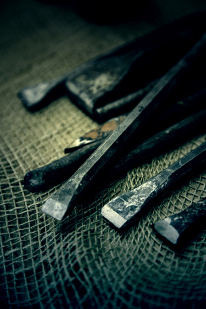 Old tools for carving stone of handmade way, detail of old manual craftの写真素材