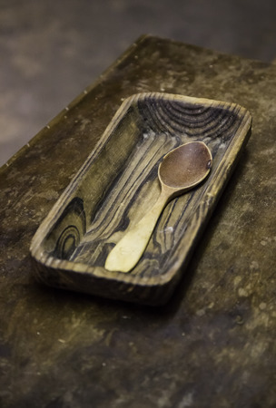 Old wooden spoon, utensil detail to eatの写真素材