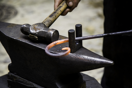 Iron incandescent in an old metal forge, industry detailの写真素材
