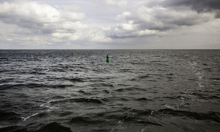 Buoy on the high seas, signaling detail for boatsの写真素材