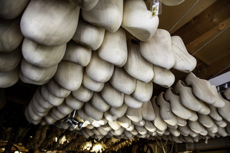 Dutch wooden clogs, shoe making detail, tradition of the Netherlandsの写真素材