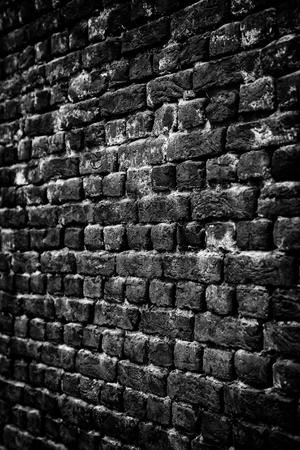 Old mud brick wall, detail of history and ancientの写真素材