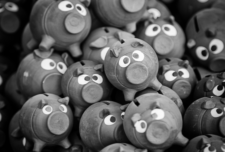 Piggy bank made by hand for saving money, detail of saving and financesの写真素材