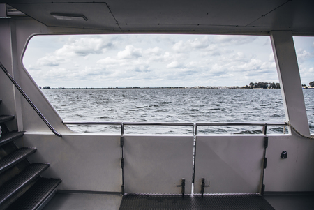 Inside a boat in the sea, detail of maritime transport, cruise and tourismの写真素材