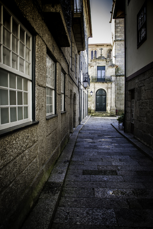 Old alley in the city, detail of an old street in a town in Spainのeditorial素材