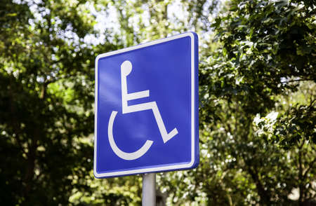 Vertical sign for disabled people, detail of information sign, facilities for peopleの写真素材