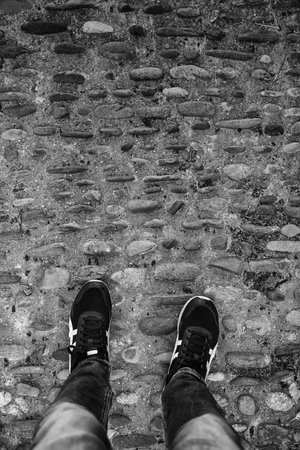 Natural stone floor and person walking, walk and sportの写真素材