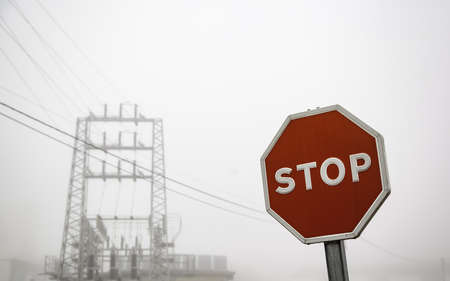 Detail of a traffic sign and obligation on a winter day