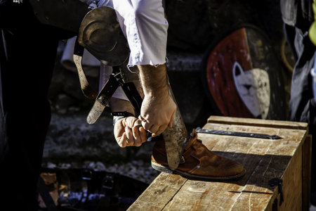 Detail of old medieval clothes at a festivalの写真素材