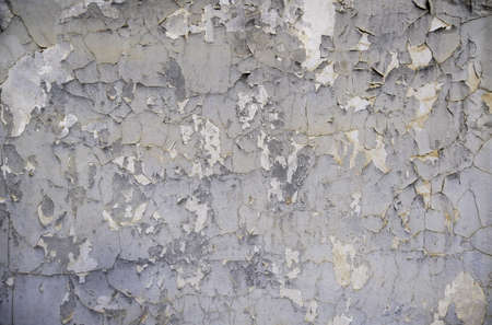 Detail of old damaged and ruined paint, abandonment and passage of timeの写真素材