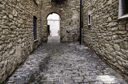 Detail of old medieval street in a town in Spain, history and tourism