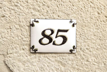 Odd number of information on a facade, address and informationの写真素材