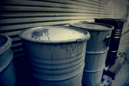 Detail of pollution and garbage, old barrels for transporting industrial liquidの写真素材