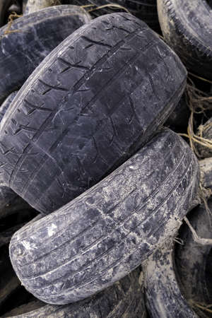 Detail of old car tires, environmental disaster, recycling