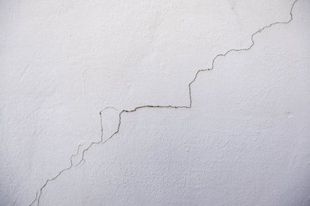 Detail of old ruined cement wallの写真素材