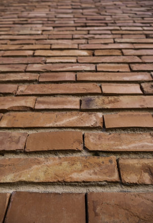 Detail of wall background with mud bricks, construction