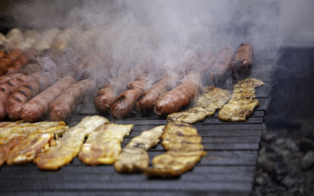Detail of roast pork on the grill, greasy food