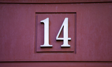 Detail of even number of information on a facade in the city, addressの写真素材