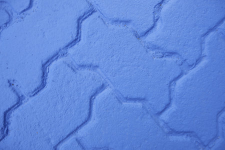 Detail of decorated paved floor in a pedestrian street in the cityの写真素材