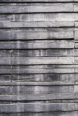 Detail of gray wooden wall in a facade, decorationの写真素材