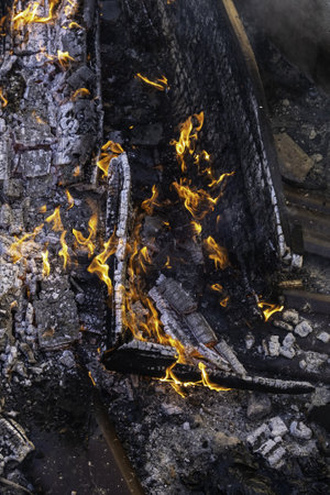 Detail of wood burning with fire and flames, destructionの写真素材