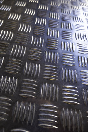 Detail of shiny metallic background with texture, steel and aluminumの写真素材