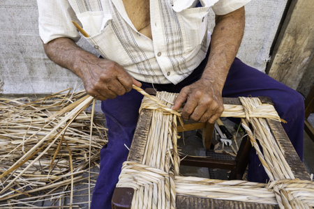 Detail of artisan manual work, manufacture of chairsの写真素材