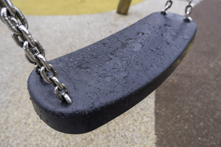 Detail of seat for a swing in a playground, game and funの写真素材