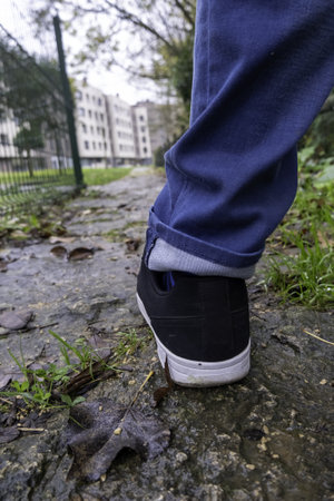 Detail of young man on a nature walk, healthy living in the forestの写真素材