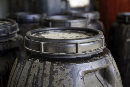 Detail of old oil barrel, pollution and recycling