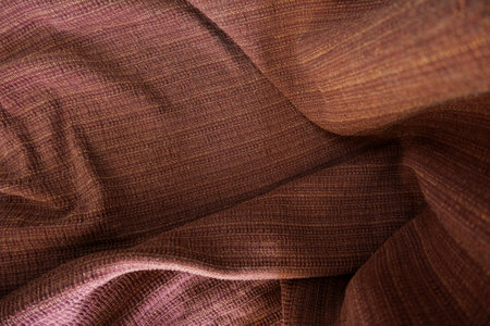 Detail of orange fabric, textured fabricの写真素材
